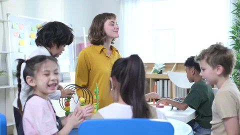 Teacher and students, Learn and study in a classroom of school Stock Footage 285334720