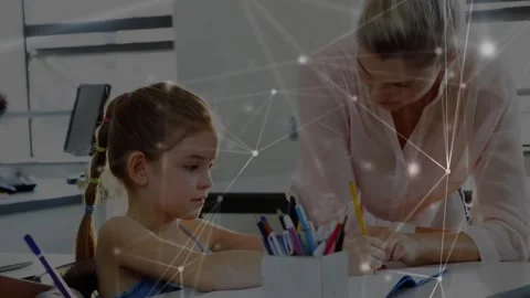 Teacher approaching student guiding pencil strokes in classroom with network Stock Footage 327196589