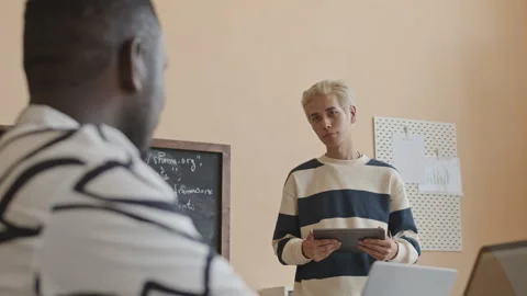 Teacher Asking Student during Programming Class in College Stock Footage 257065669