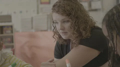 Teacher assisting students Stock Footage 62825982