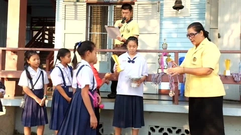 Teacher awarded to students. Elementary School, Bangkok Thailand Stock Footage 47299563