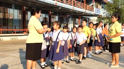 Teacher awarded to students. Elementary School, Bangkok Thailand Stock Footage 47300469