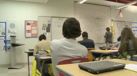 Teacher at board in front of class (2 of 5) Video stock 8979979
