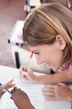 The teacher checking the homework Stock Photos