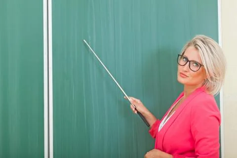 Teacher in class. Stock Photos