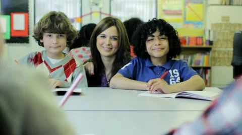 Teacher in classroom Stock Footage 22663940