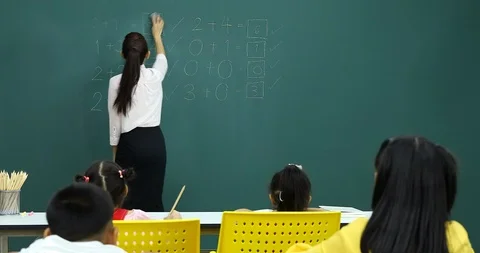 Teacher clean the board the have math problems. Stock Footage 103793768