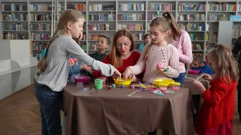 Teacher communicating with kids during masterclass Stock Footage 157993705
