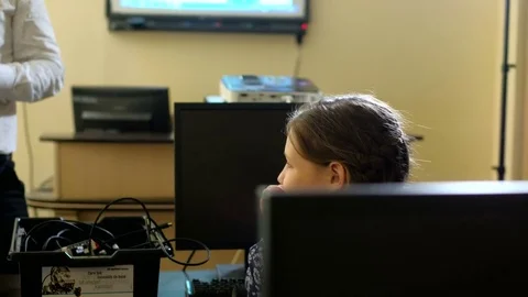 Teacher with computer takes a math class 4k Stock Footage 74290984