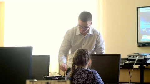 Teacher with computer takes a math class 4k Stock Footage 74291455