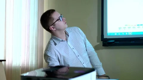 Teacher with computer takes a math class 4k Stock Footage 74427686