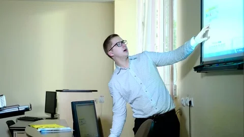 Teacher with computer takes a math class 4k Stock Footage 74586050