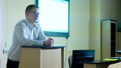 Teacher with computer takes a math class 4k Stock Footage 74608653