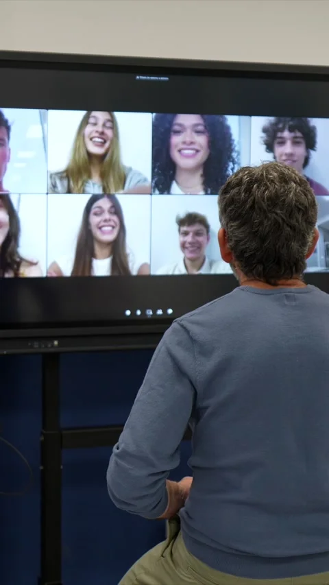 Teacher conducting online lesson with students on screen Stock Footage 337035895