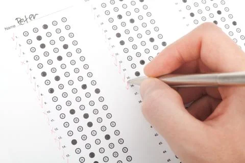 Teacher correct test Stock Photos