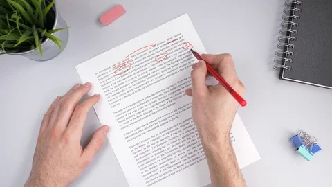 Teacher Correcting a Text With Many Errors With Marker 스톡 동영상 99748325