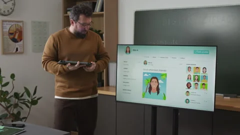 Teacher Explaining Social Media in Computer Literacy Class Stock Footage 333705157