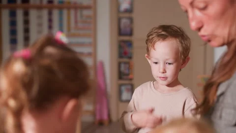 Teacher Explains Tortoise Behavior To Children In Classroom Stock Footage 321474038