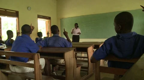 TEACHER IN FRONT OF CLASS, STUDENTS DO TRADITIONAL CLAP Stock Footage 60116230