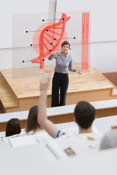 Teacher in front of futuristic interface pointing college student Illustrazione stock