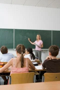 Teacher in front of her class Stock Photos