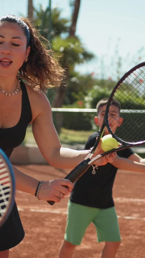 Teacher Gives A Basic Tennis Lesson For Children Video stock 281718055