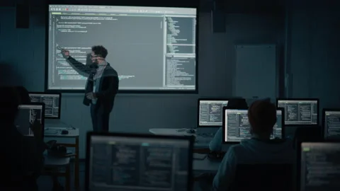 Teacher Gives Computer Science IT Class to Diverse Students Stock Footage 163977786