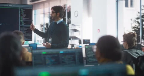 Teacher Gives IT Class to Diverse Students Stock Footage 243650136