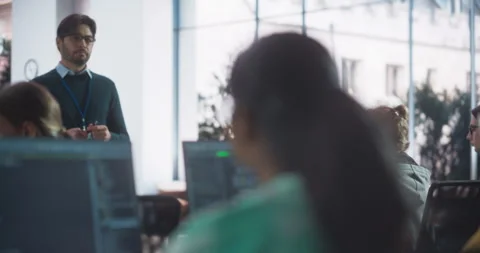 Teacher Gives IT Class to Diverse Students Stock Footage 243650222