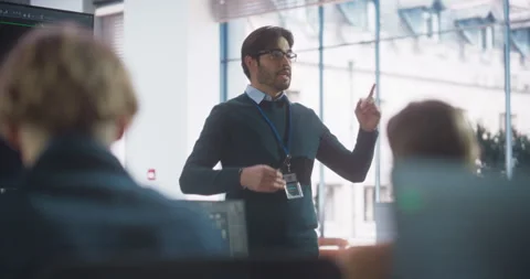 Teacher Gives IT Class to Diverse Students Stock Footage 243650275