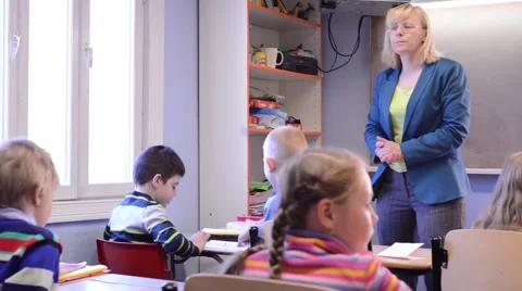 Teacher Giving Instuctions In Classroom, pan Stock Footage 40453418