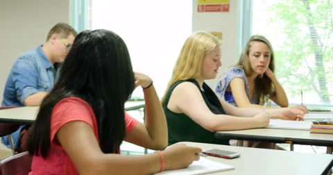 Teacher giving lecture to students &amp; teaching class. Ultra HD 4K Stock-Footage 44523995