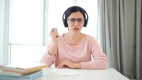 Teacher giving lesson using internet connection Stock Footage 157315260