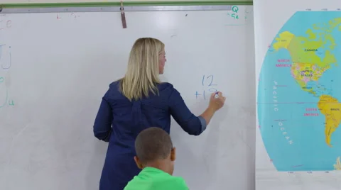Teacher giving math lesson at school Stock Footage 68963048