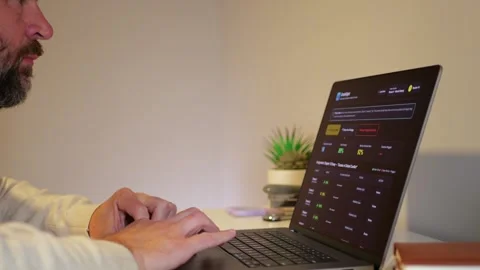 Teacher Grading Papers with AI to Flag Plagiarism Stock Footage 343895202