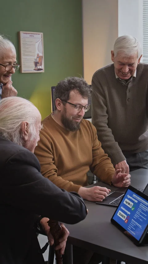 Teacher with Group of Seniors in Computer Class Vertical Stock Footage 333756490
