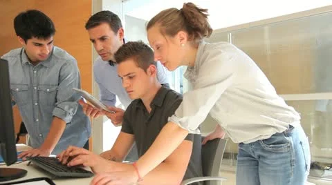 Teacher with group of students in class Stock Footage 14827242