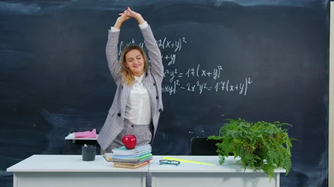 Teacher is happy about end of school year Stock Footage