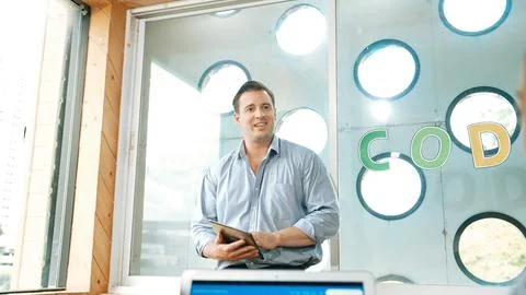 Teacher hold tablet while explain about coding or writing program. Edification. Stockfoto's