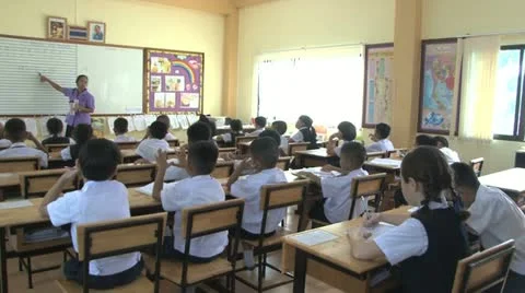 Teacher Instructing Asian Students In Class 스톡 동영상 12435467