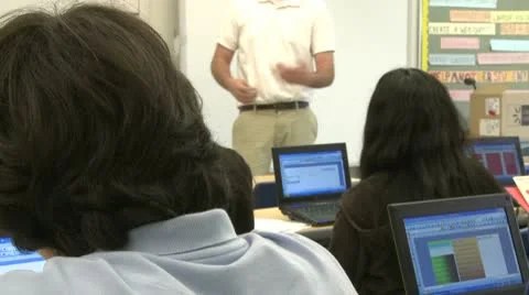 Teacher instructing computer class (2 of 2) Stock Footage 8979045