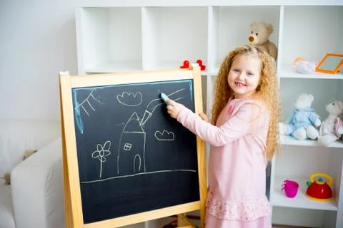 Teacher in kindergarten Stock Photos