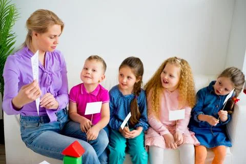 Teacher in kindergarten Stock Photos