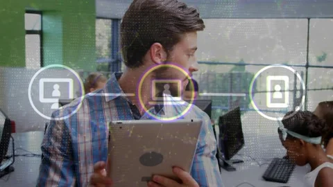 Teacher in lab tapping tablet launching user icons, center icon pulsing while Stock Footage 330443979