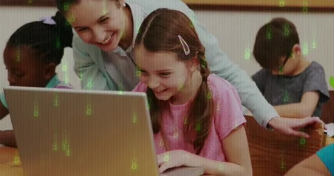 Teacher leaning and gesturing, student typing on laptop with green code overlay Stock Footage 330396697