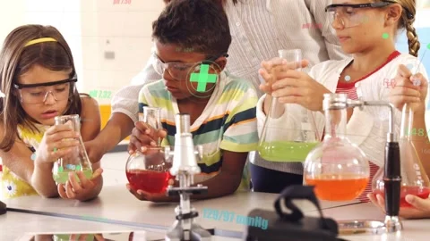Teacher leaning in guiding class mixing flasks, overlays showing liquid colors Stock Footage 333950159