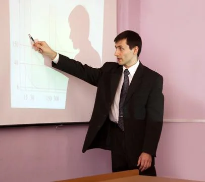 Teacher lecturing in a classroom Stock Photos