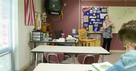 Teacher lecturing students and teaching class. Ultra HD 4K Video stock 44405754