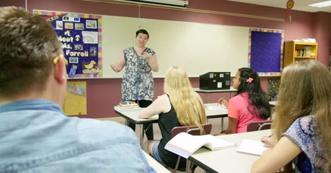 Teacher lecturing students and teaching class. Ultra HD 4K Stock-Footage 44435709