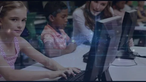 Teacher moving between desks, guiding center boy on keys for class; girl typing, Stock Footage 329752365
